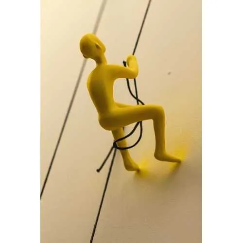 6" x 3" x 3" Resin Yellow Climbing Man